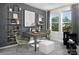 A home office bathed in sunlight from the large bright window at 9020 Northfield Crossing Dr, Charlotte, NC 28269