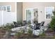Inviting outdoor patio with modern chairs, perfect for entertaining and relaxation at 9020 Northfield Crossing Dr, Charlotte, NC 28269