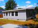 Desirable home with sunroom featuring newer windows and a spacious yard at 101 Colony Acres Dr, Charlotte, NC 28217