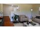 Inviting living room featuring a cozy chair, modern decor, and an open layout at 101 Colony Acres Dr, Charlotte, NC 28217
