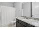Clean bathroom featuring granite vanity and shower-tub combination, provides functionality at 108 Hillston Ln, Mooresville, NC 28115