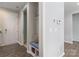 A charming entryway features a built-in bench with storage cubbies and coat hooks at 108 Hillston Ln, Mooresville, NC 28115