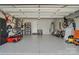 Spacious garage with epoxy flooring, ample storage, and room for multiple vehicles and equipment at 108 Hillston Ln, Mooresville, NC 28115