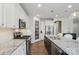 Stylish kitchen with stainless steel appliances, granite countertops, and bright lighting is spacious at 108 Hillston Ln, Mooresville, NC 28115