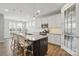 Spacious kitchen featuring granite island, stainless appliances, and pendant lighting, perfect for cooking at 108 Hillston Ln, Mooresville, NC 28115