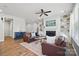 Spacious living room with fireplace and built-in shelves and hardwood floors at 108 Hillston Ln, Mooresville, NC 28115