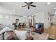 Open-concept living room flowing into the kitchen area, ideal for Gathering time and entertaining at 108 Hillston Ln, Mooresville, NC 28115