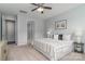 Serene bedroom features plush carpeting, soft lighting, and easy access to a nearby bathroom at 108 Hillston Ln, Mooresville, NC 28115
