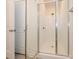 Glass enclosed shower featuring white subway tile at 1311 Cerium Way, Charlotte, NC 28211