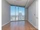 Bright bedroom with amazing city views through floor to ceiling windows at 210 N Church St # 3606, Charlotte, NC 28202