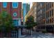 Street view showcasing Basil Thai Cuisine restaurant with surrounding buildings at 210 N Church St # 3606, Charlotte, NC 28202