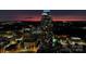 Scenic aerial view of the city skyline at twilight, featuring illuminated high-rise buildings at 210 N Church St # 3606, Charlotte, NC 28202