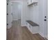 Mudroom with storage bench and coat rack at 2226 Zinker Rd, Rock Hill, SC 29732