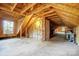 Spacious unfinished attic space with exposed wood and potential for customization at 2371 Kingsburry Rd, York, SC 29745