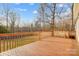 Large wooden deck overlooking mature trees and serene backyard at 2371 Kingsburry Rd, York, SC 29745