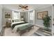 A staged bedroom featuring a ceiling fan, rug, lamps, wall art, and a large bed at 2478 Stribling Cir, Lancaster, SC 29720