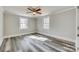 Bedroom featuring hardwood floors, ceiling fan, and natural lighting at 2478 Stribling Cir, Lancaster, SC 29720