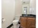 This bathroom features dark countertops, and hardwood floors at 309 Settlers Ln, Charlotte, NC 28202