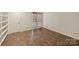 Bedroom with built-in shelves and outdoor access, perfect for relaxation at 309 Settlers Ln, Charlotte, NC 28202