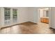 This bedroom features french doors, ceramic tile flooring, and an ensuite bathroom at 309 Settlers Ln, Charlotte, NC 28202