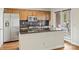 Well-equipped kitchen featuring stainless steel appliances, granite countertops, and a modern backsplash for style and functionality at 309 Settlers Ln, Charlotte, NC 28202