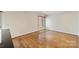 This living room has hardwood floors and bright walls at 309 Settlers Ln, Charlotte, NC 28202