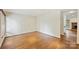 This living room has hardwood floors and bright walls at 309 Settlers Ln, Charlotte, NC 28202