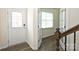 The entryway shows staircase with hardwood floors, and a glass insert front door at 4010 Richard Andrew Dr, Matthews, NC 28105