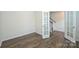 Spacious office shows French doors, staircase and hardwood floors at 4010 Richard Andrew Dr, Matthews, NC 28105