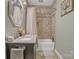 Bathroom features a shower-tub combination and a vanity with marble countertops, providing a luxurious space at 530 Wilmot Trl, Gastonia, NC 28056