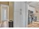 View of a modern kitchen that offers a blend of white and blue cabinetry, stainless steel appliances, and hardwood floors at 530 Wilmot Trl, Gastonia, NC 28056