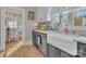 Bright kitchen featuring modern appliances, white countertops, and a farmhouse sink at 530 Wilmot Trl, Gastonia, NC 28056