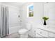 This bathroom features tiled flooring, a single vanity, and a shower over tub at 680 Candela Ct # 52, York, SC 29745