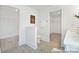 This bathroom has tiled floors and open access to the dual walk-in closets at 680 Candela Ct # 52, York, SC 29745