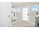Bright entryway with a modern front door, custom drop zone, and stylish decor for an inviting first impression at 680 Candela Ct # 52, York, SC 29745
