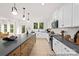 Bright, airy kitchen featuring an island, stainless steel appliances and modern fixtures with lots of countertop space at 680 Candela Ct # 52, York, SC 29745
