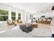 Spacious living room with modern furniture, bright windows, and open concept floor plan at 680 Candela Ct # 52, York, SC 29745