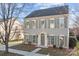 Charming two-story home with classic shutters and a well-manicured lawn in a serene neighborhood at 7007 Church Wood Ln, Huntersville, NC 28078