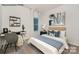 Cozy bedroom with a comfortable bed, a modern desk, and neutral decor at 7921 Old Brook Rd, Sherrills Ford, NC 28673