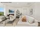 Cozy living room with fireplace, plush sofa, and view of the outdoors at 7921 Old Brook Rd, Sherrills Ford, NC 28673