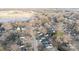 Aerial view of neighborhood homes, road, body of water and a sports field at 968 Waverly Ave, Rock Hill, SC 29730