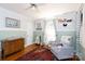 Charming Bedroom with a gray glider, classic dresser, and a cozy, inviting atmosphere at 968 Waverly Ave, Rock Hill, SC 29730
