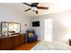 Bedroom with hardwood floors, a ceiling fan, dresser and television at 968 Waverly Ave, Rock Hill, SC 29730