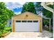 Spacious garage with an attached covered patio and well-maintained lawn at 968 Waverly Ave, Rock Hill, SC 29730