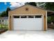 Exterior view of a new garage with a large door and a decorative star feature at 968 Waverly Ave, Rock Hill, SC 29730