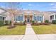 Inviting home exterior with a well-manicured lawn, charming front porch, and beautiful landscaping enhancing its curb appeal at 11135 Bailey Park Nature Dr, Cornelius, NC 28031