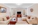 Bright living room with hardwood floors, large sofas, and a central coffee table, great for Gathering at 11135 Bailey Park Nature Dr, Cornelius, NC 28031