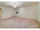 Minimalist bedroom with carpet, offering a blank canvas for your personal decor at 113 2Nd St, Spencer, NC 28159