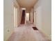 Hallway providing access to the upper levels of the home at 113 2Nd St, Spencer, NC 28159