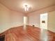 Inviting room with hardwood floors, offering versatility for living or entertaining at 113 2Nd St, Spencer, NC 28159